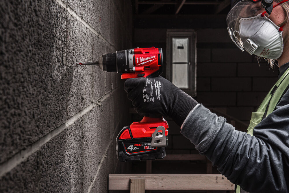 Milwaukee M18 FPP2IT-542X - Set utensili 18V Trapano M18 BLPDRC + Smerigliatrice M18 FSAG125X - 1 x 4Ah + 1 x 5Ah